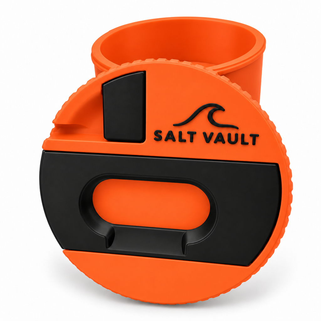Salt Vault in Rescue Orange with the lid standing in front of the open tub