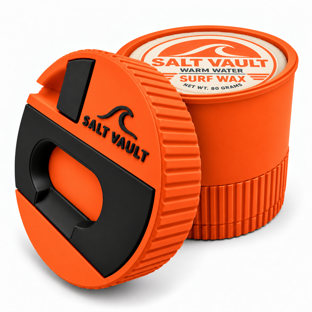 Rescue Orange Salt Vault with Salt Vault Warm Water surf wax in the tub, lid tilted beside it. Wax shown for illustration only, not included