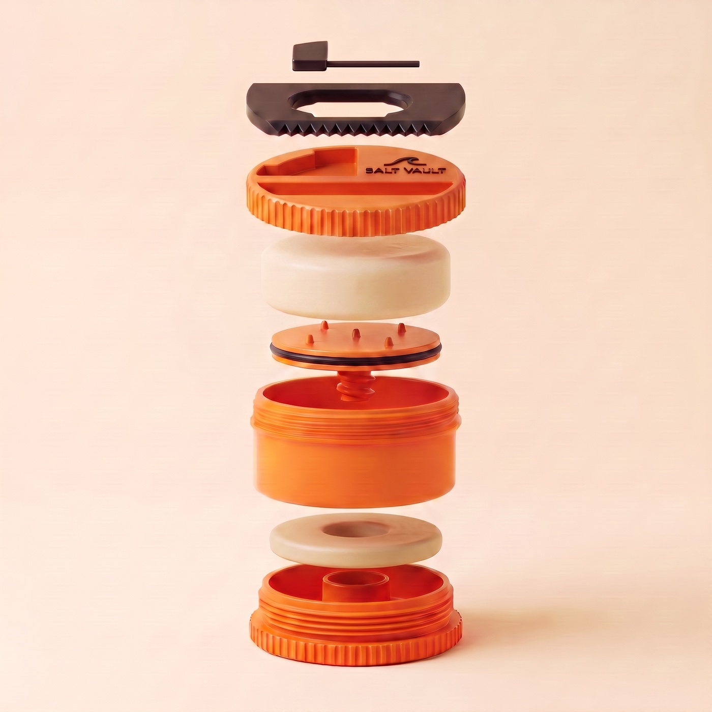 Salt Vault exploded into its parts: fin key, wax comb with bottle opener, lid, wax bar, pusher, tub, zinc ring and wind-up base